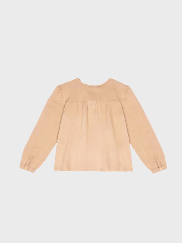 blouse beige pompon vêtement enfant fille mode idée tenue fête joli pas cher boutique saint martin en haut